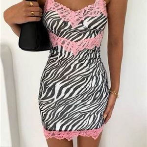 Zebra print mini dress with pink lace trim